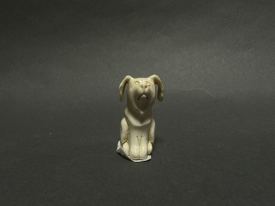 "Пёс", скульптура из кости