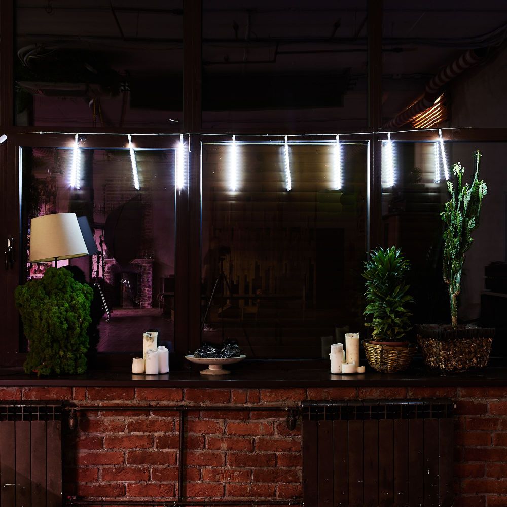 ULD-E2403-144-DTK WHITE IP44 METEOR Занавес светодиодный фигурный Падающие звезды. соединяемый. 2х0.3м. 8 подвесов. Белый свет. Провод прозрачный. TM Uniel.