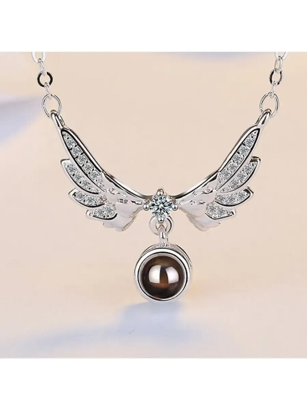 Цепочка с крыльями и проекцией Я тебя люблю на 100 языках