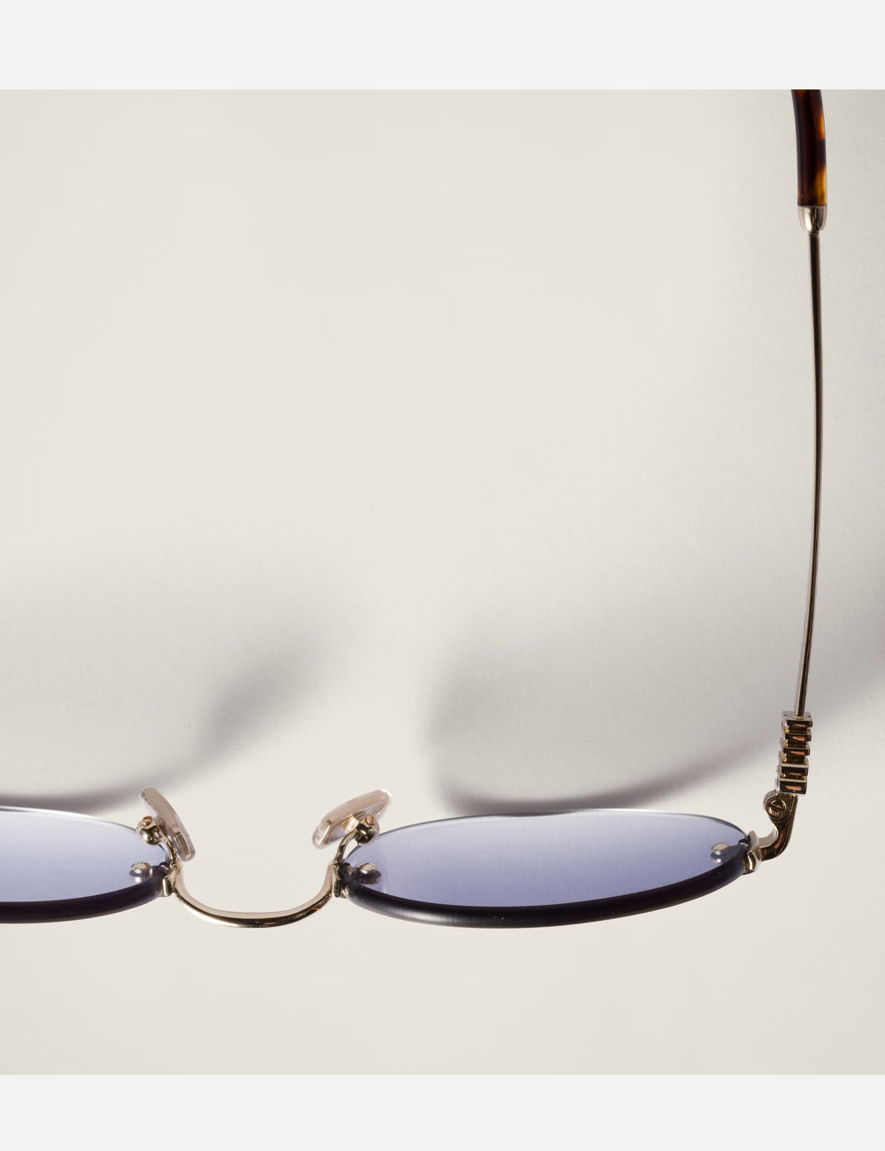 Солнцезащитные очки Miu Miu Logo Indigo lenses