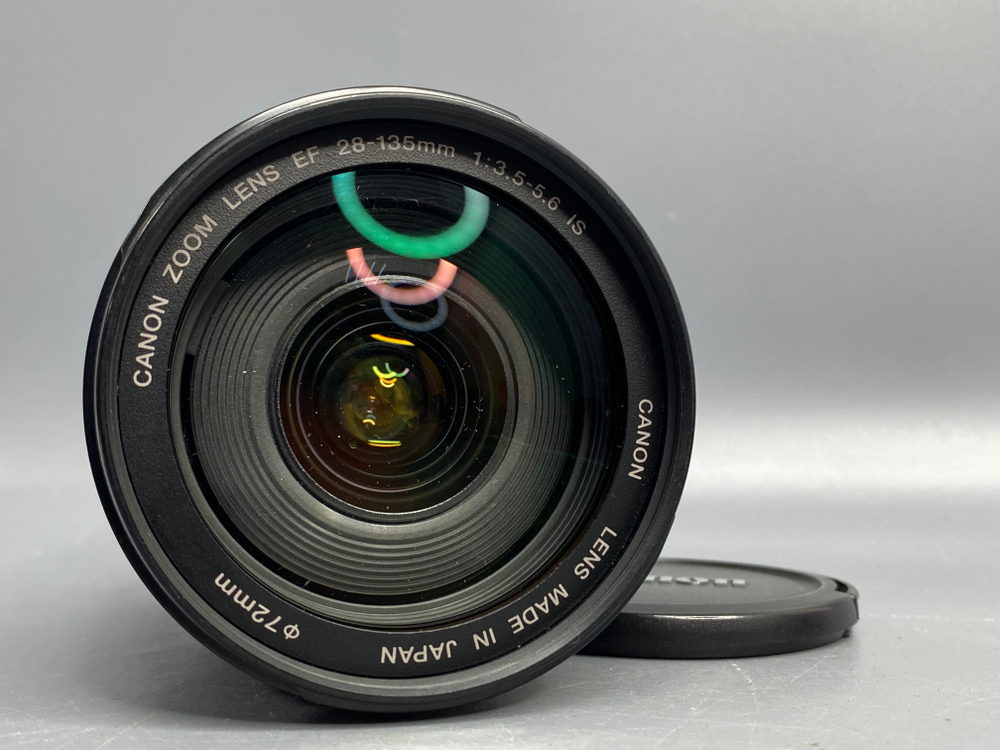 Canon EF 28-135mm 3.5-5.6 IS USM царапка на передней линзе
