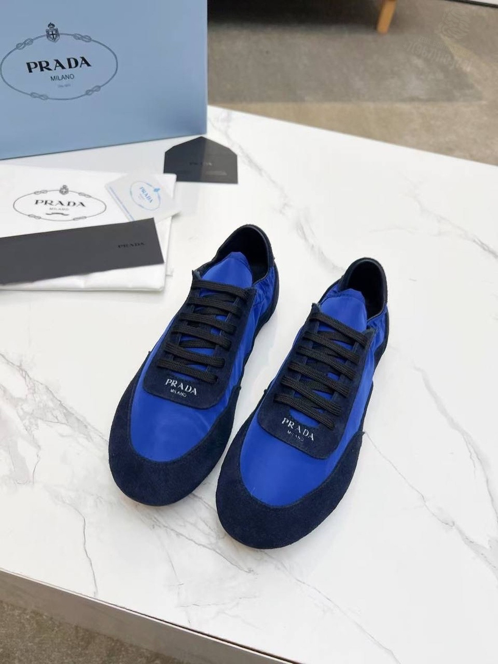 Кроссовки Prada