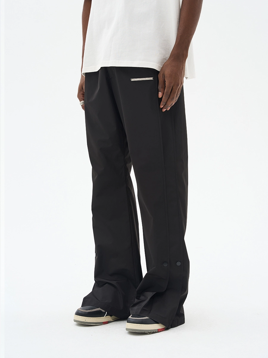 Брюки HARSHandCRUEL Wide fit Nylon Buttoned Pants