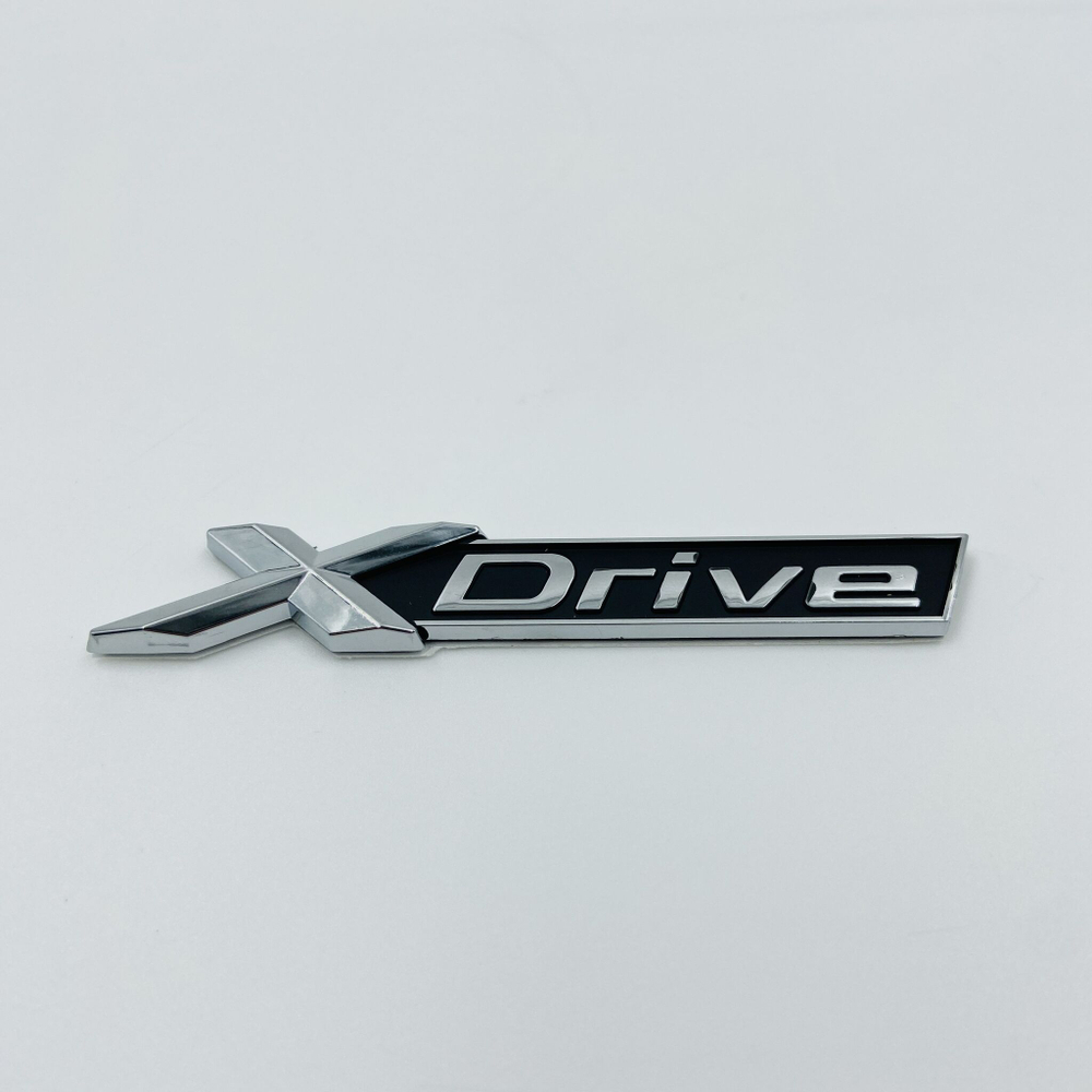 Эмблема (шильдик) XDrive пластик серебряная 1 шт