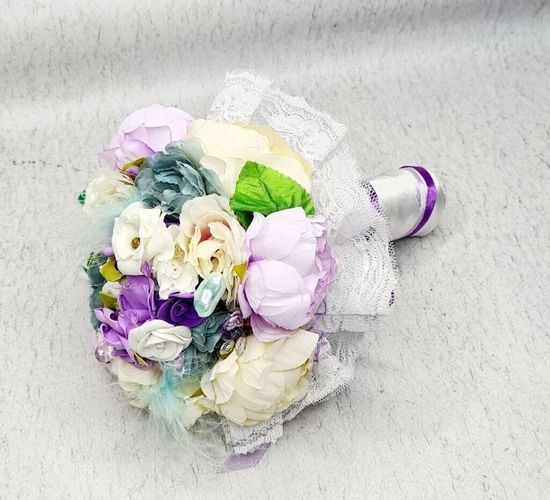 Свадебный букет из маков из орхидей