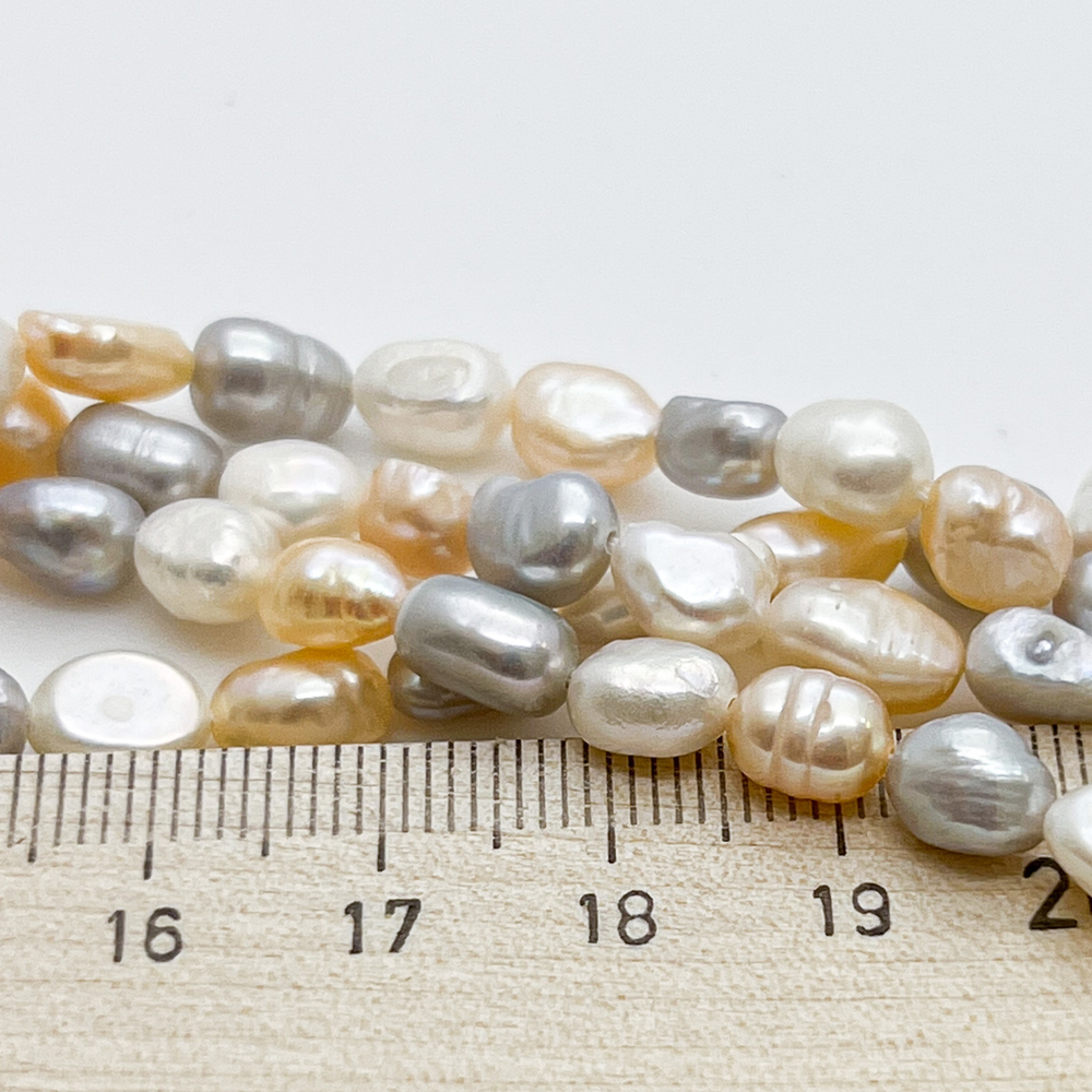 Жемчуг, цвет микс, размер около 7-8*5,5-6,5 мм, цена за 21-22 шт (1/2 нити)