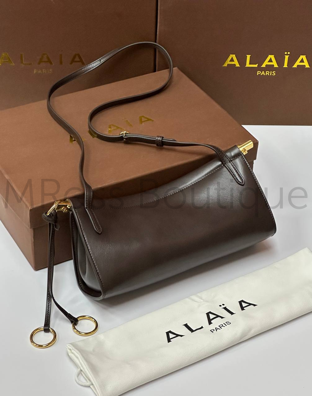Женская сумка Alaia Le Click East West коричневого цвета