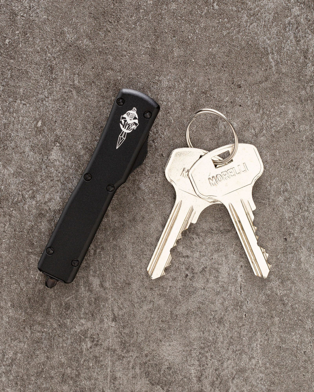 Автоматический складной нож Microtech UTX-70 Hellhound DLC Blade Signature Series 419-1DLCTS (черный-черный) фронталка/выкидуха