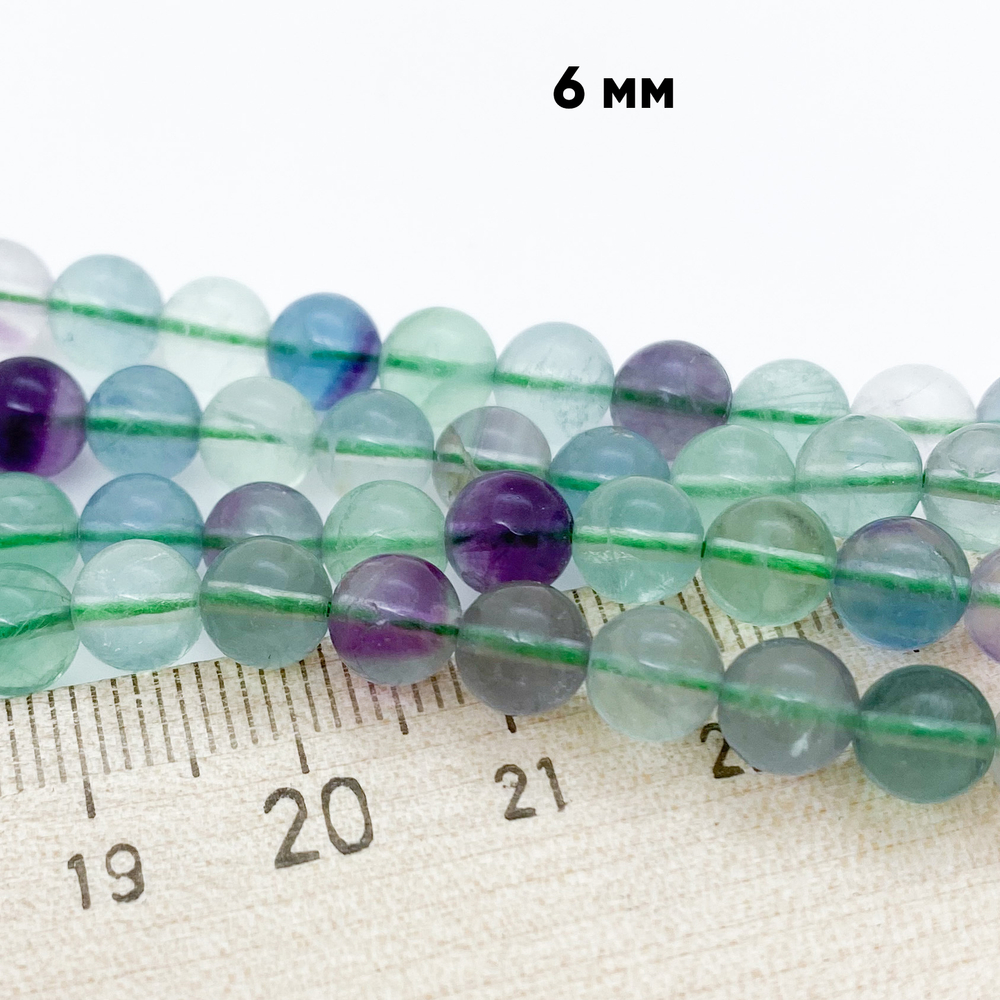 Флюорит, диаметр 6,2-6,3 мм, цена за 31-32 шт (1/2 нити)