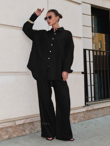 Льняной брючный костюм черного цвета