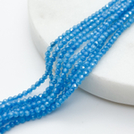 Фианит (кубический цирконий), цвет голубой яркий, размер 2 мм, цена за нить около 130 шт (38 см)