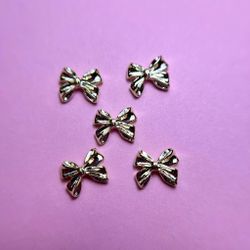 1853 Фигурки объёмные "Бантики" металл 5 шт