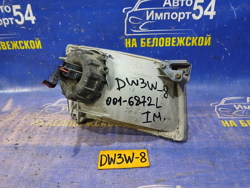 Фара передняя левая MAZDA DEMIO 1998