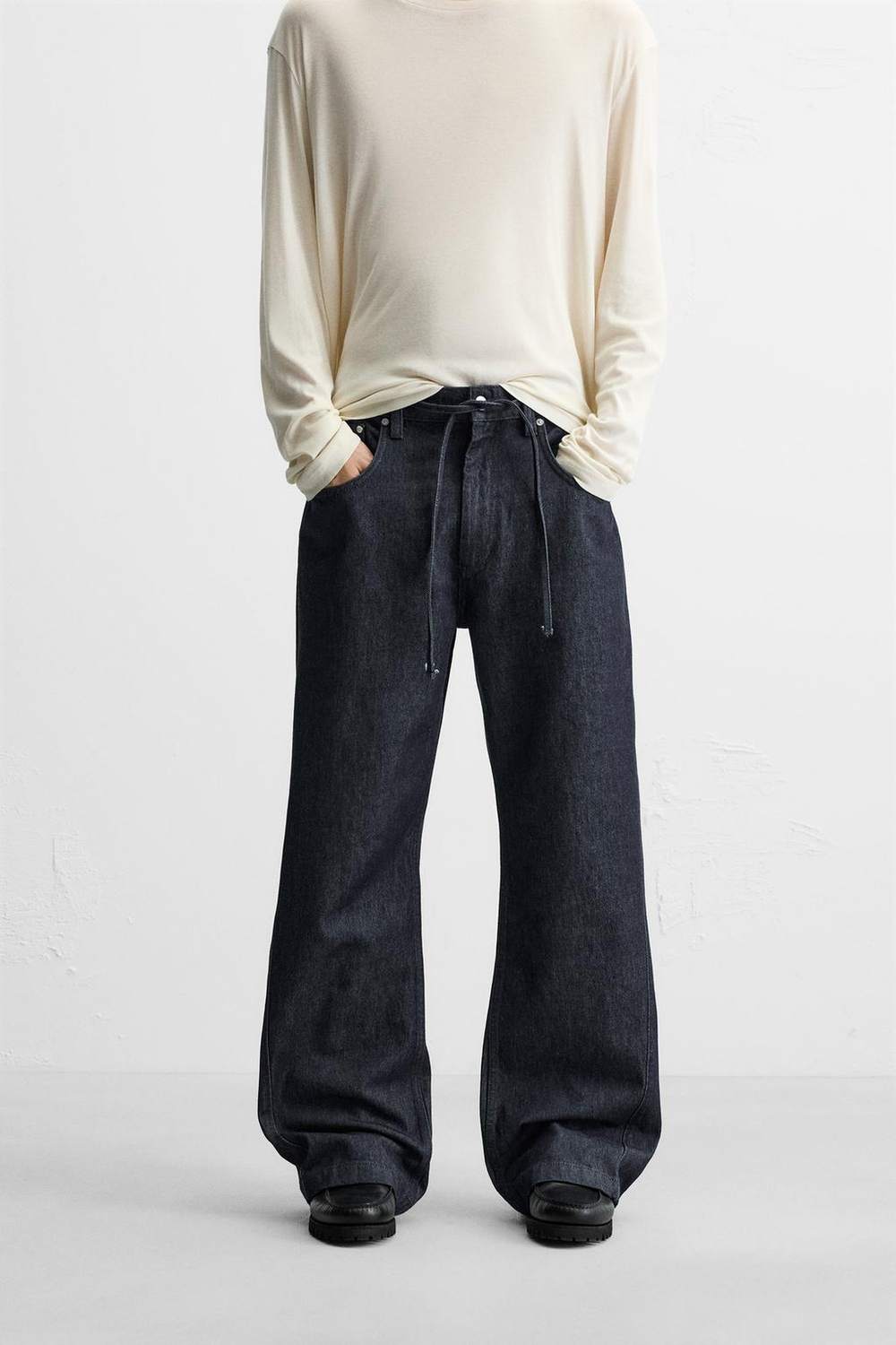 Джинсы flared fit