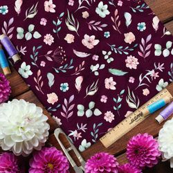 Ткань атлас сдержанные цветы и листья на бордовом фоне