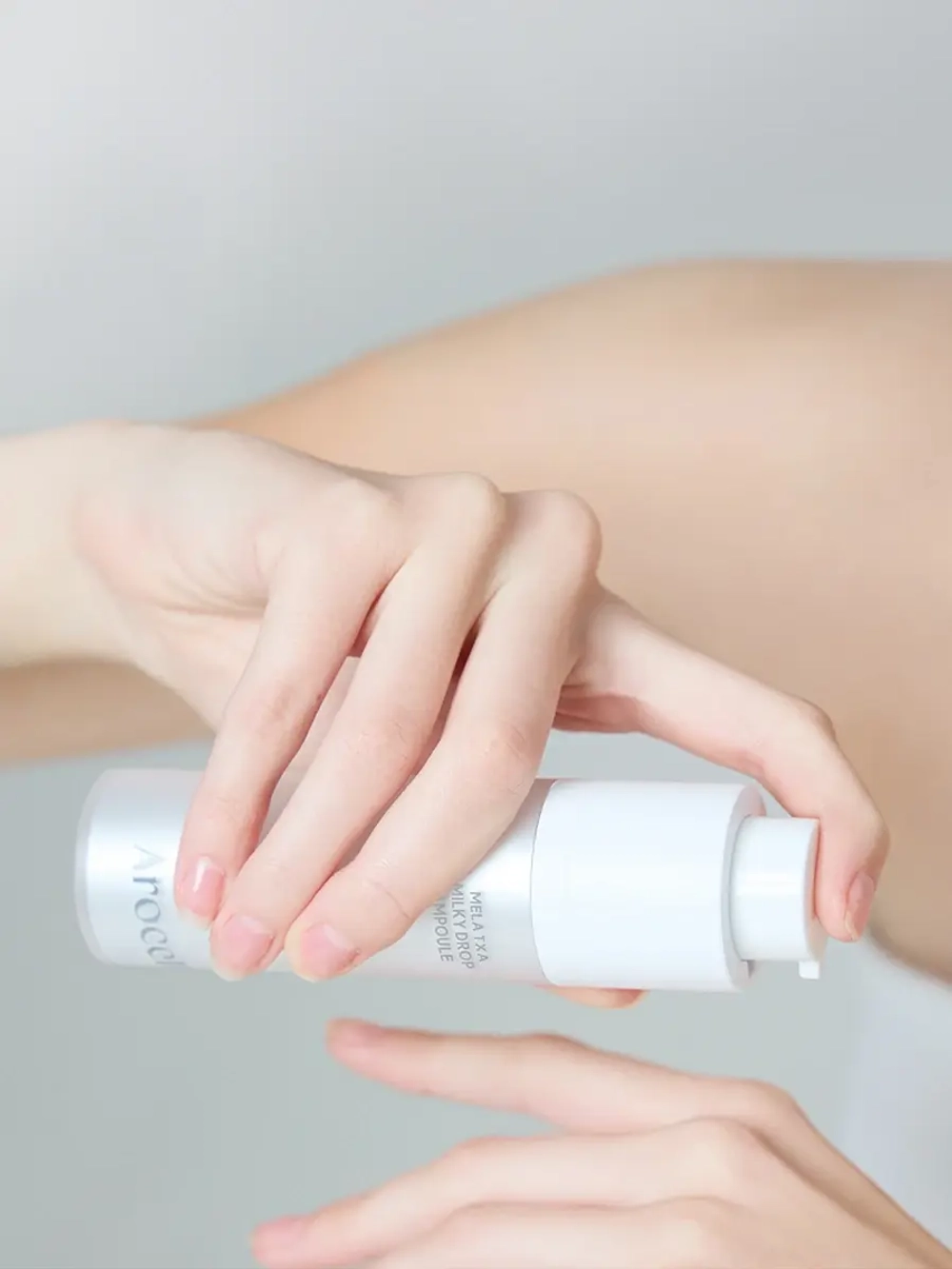 Arocell Сыворотка «Сияние и Ровный тон» с мелатонином, транексамовой кислотой и экзосомами молока Mela TXA Milky Drop Ampoule 30 мл