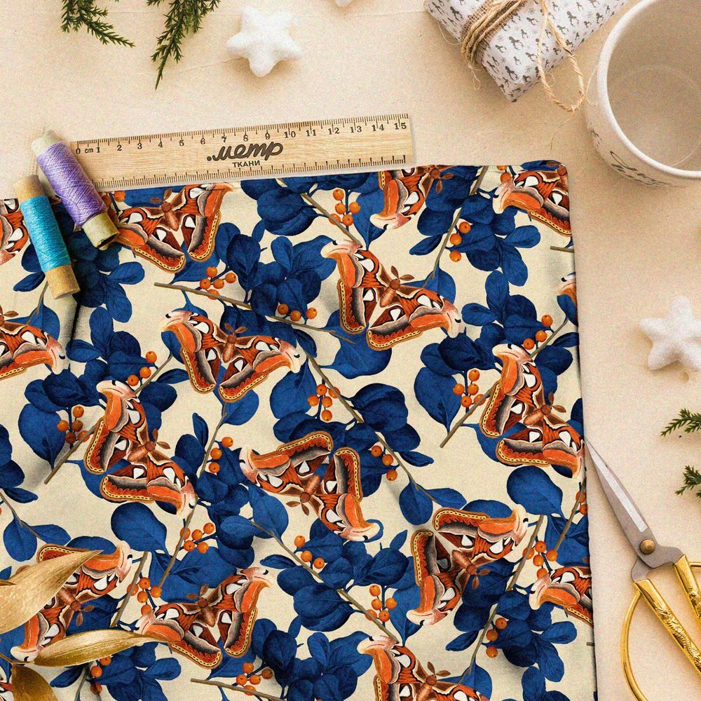 Ткань дюспо оранжевые бабочки и синие листья на жёлтом фоне