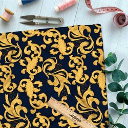 Ткань бифлекс золотые завитки листьев на чёрном фоне