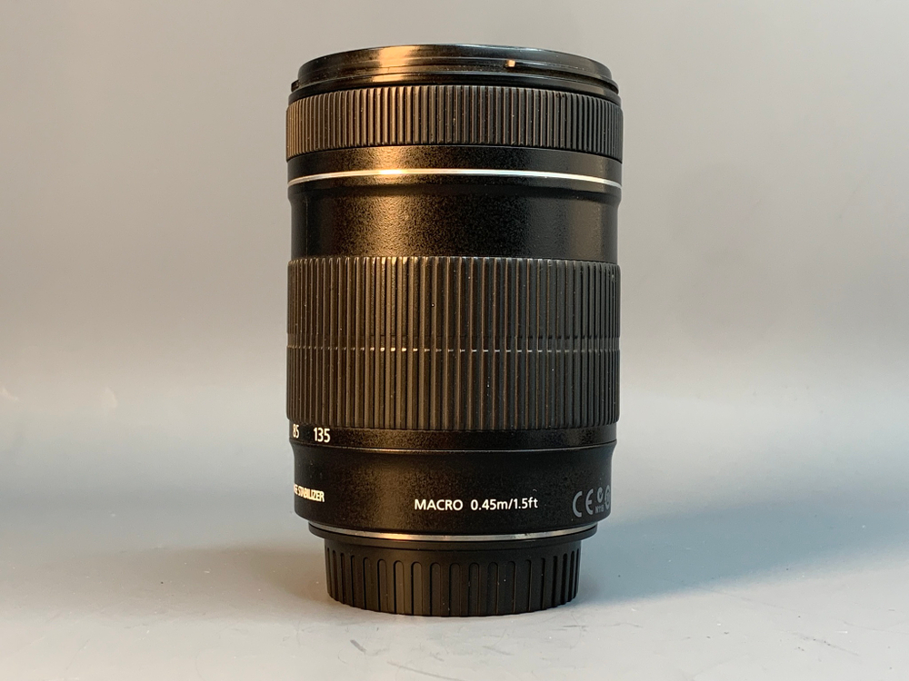 Canon EF-S 18-135mm пыль внутри передней линзы
