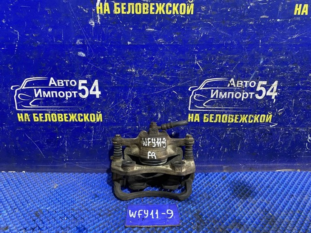 Суппорт тормозной передний правый NISSAN WINGROAD 2000