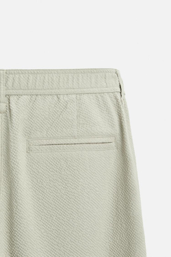 ZARA БРЮКИ ИЗ РЕЛЬЕФНОЙ ТКАНИ С ЗАЩИПАМИ, СЕРОВАТЫЙ