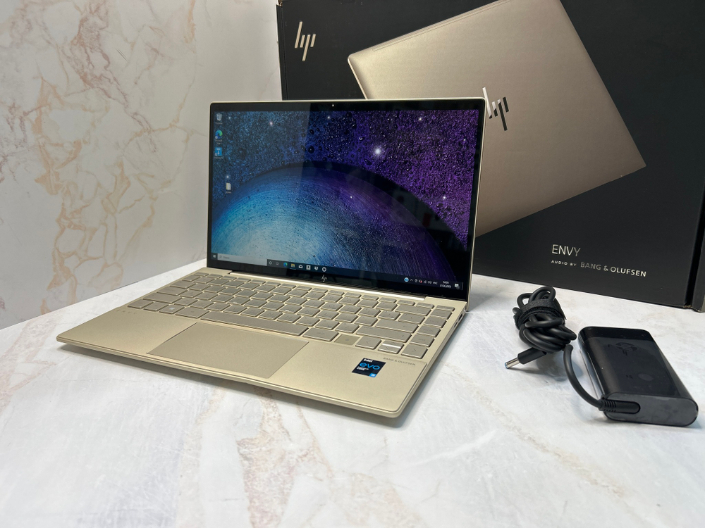 Ноутбук HP ENVY 13-ba1015ur. Производитель CPU: Intel, Линейка CPU: Core i5, CPU: i5-1135G7, RAM: 8Gb, SSD: 512Gb, GPU: Intel Iris Xe, Диагональ: 13.3", Разрешение: 1920*1080, Тип экрана: IPS, OS: Win 10, Цвет: Золотистый, BackLight: LED, Состояние: B1
