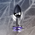 Маленькая коническая серебристая анальная пробка 7см с фиолетовым кристаллом ToyFa Metal 717001-4