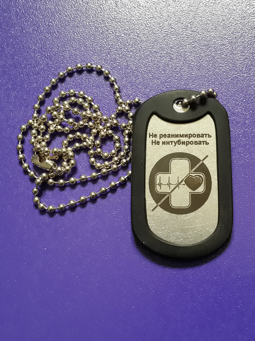 Стальной жетон с изображением