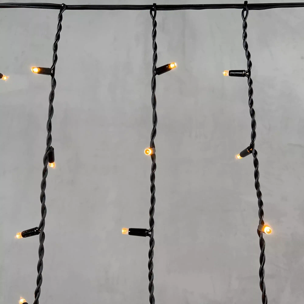 Светодиодная бахрома с колпачком 3,2*0,9 м., 168 экстра теплых белых LED ламп, каучуковый черный провод, LTC (LL168-1-2EWW)