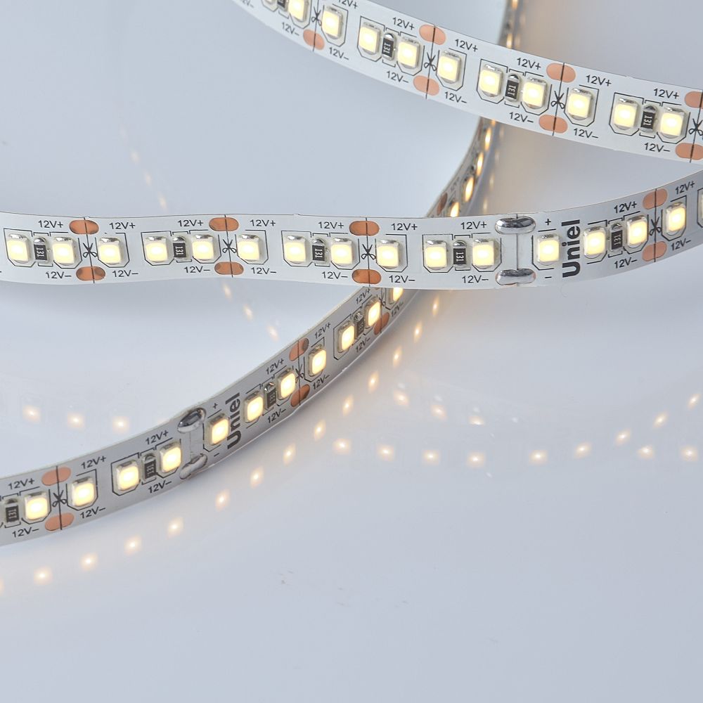 ULS-M16-2835-180LED-m-10mm-IP20-DC12V-17W-m-5M-3000K PROFI Гибкая светодиодная лента на самоклеящейся основе. Катушка 5м. в герметичной упаковке. Теплый белый свет3000К. ТМ Uniel