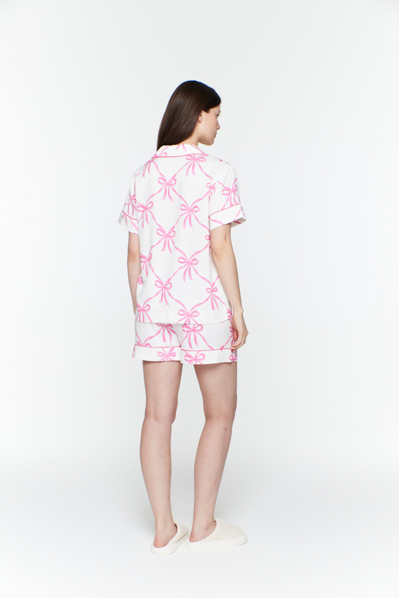 Блуза из вискозы с кантом и бантами