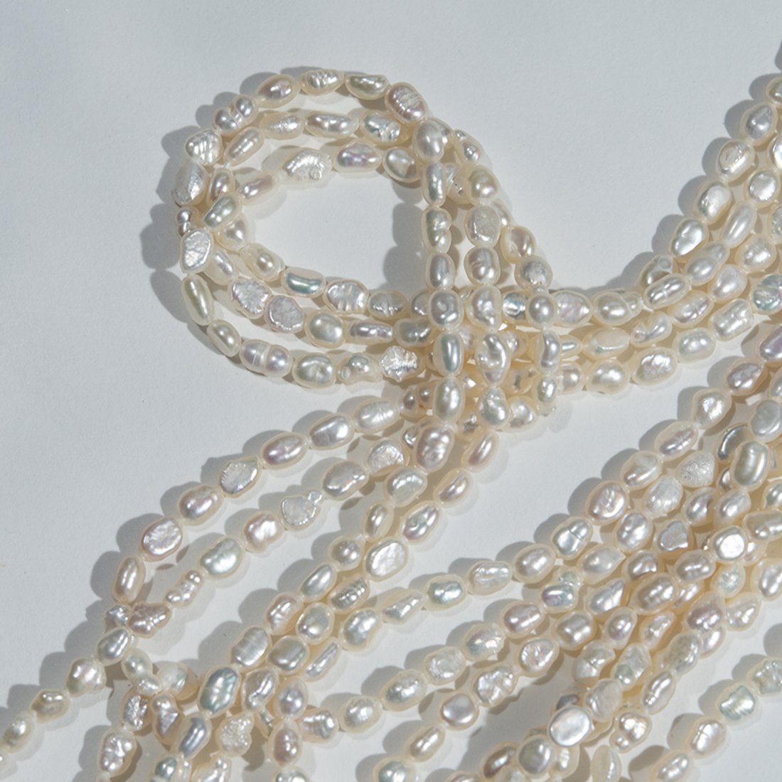 Жемчуг культивированный фриформ A Grade, белый, 3,5*5мм