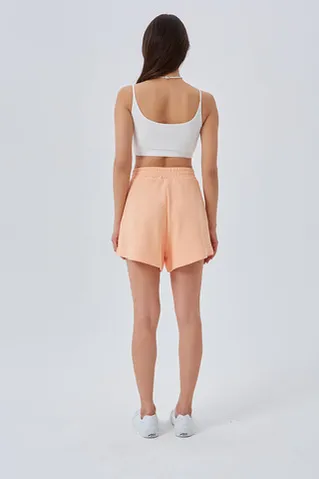 Шорты укороченные из рифленого хлопка персикового цвета
