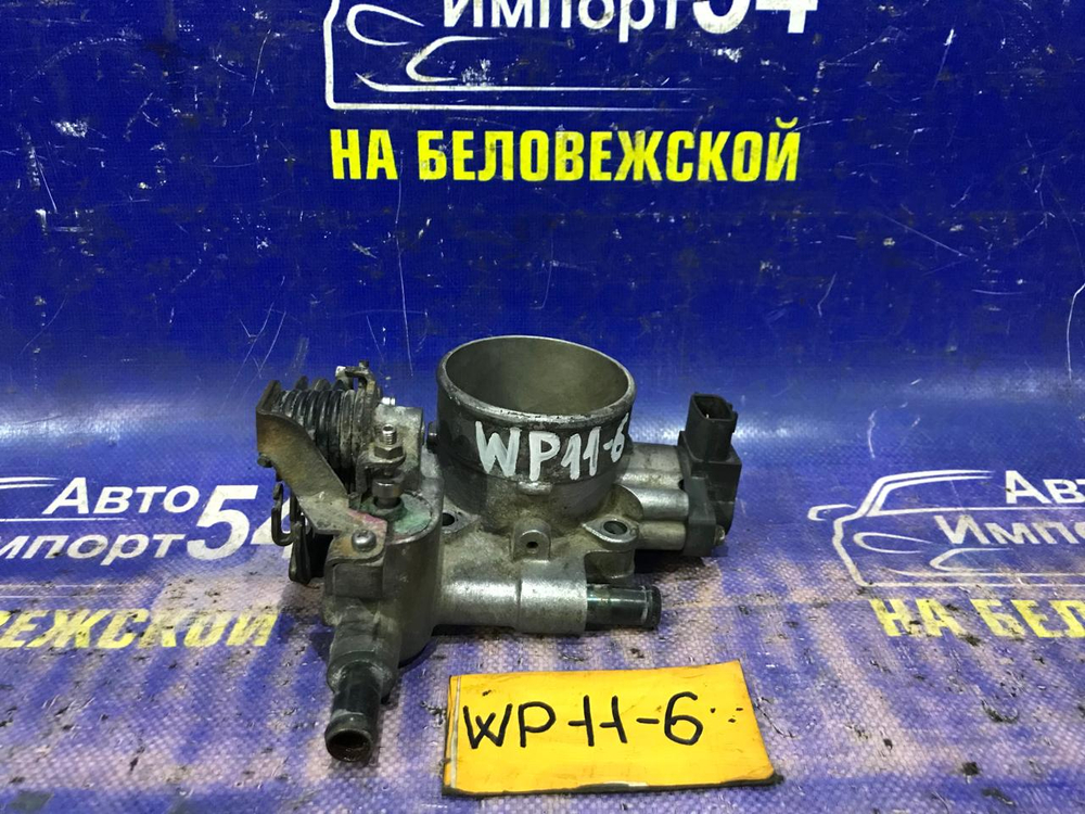 Дроссельная заслонка NISSAN PRIMERA 1997