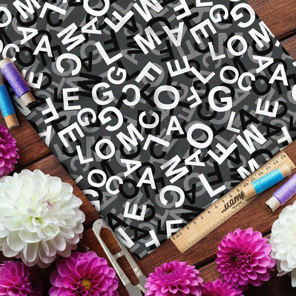 Ткань оксфорд 600 хаос их букв на чёрном фоне