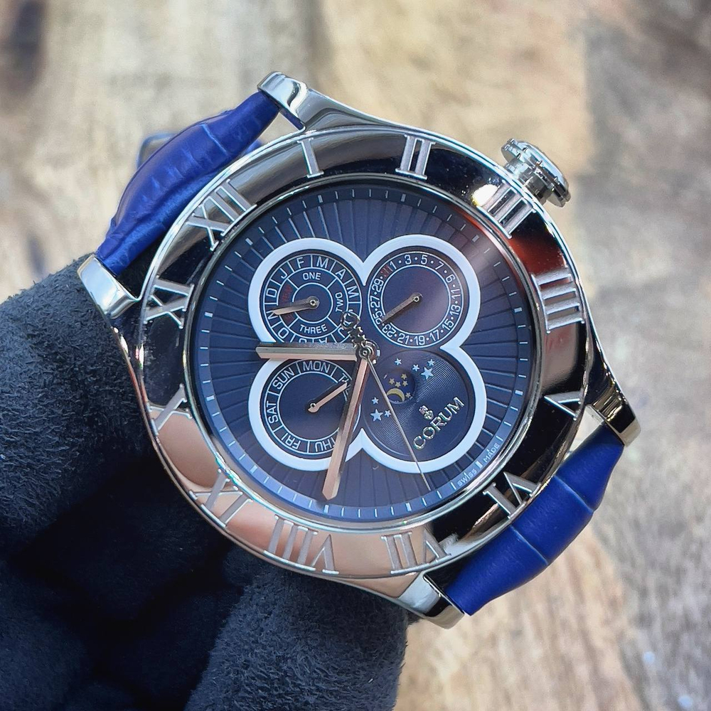 Часы Corum