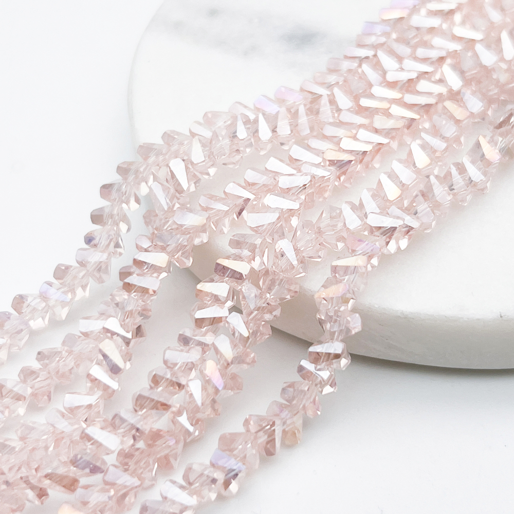 Бусина Треугольник, стекло, цвет розовый АВ, размер около 4,5*5,5 мм, цена за нить 28 см