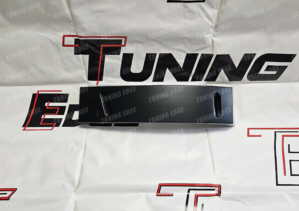 Рамка под номер на передний бампер Misrubishi Lancer X 2010-2016 (текстурный пластик)