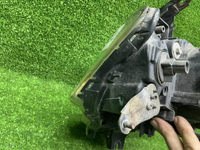 Фара левая Mitsubishi Pajero Sport 2 13-16 ксенон