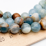 Кальцит бусины, диаметр около 10-10,1 мм, цена за 9 шт (1/4 нити)