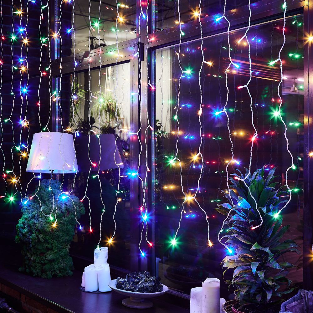 ULD-C3020-240-STK MULTI IP44 Занавес светодиодный со статическим свечением. 3х2м. Соединяемый. 240 светодиодов. Разноцветный свет. Провод прозрачный. TM Uniel