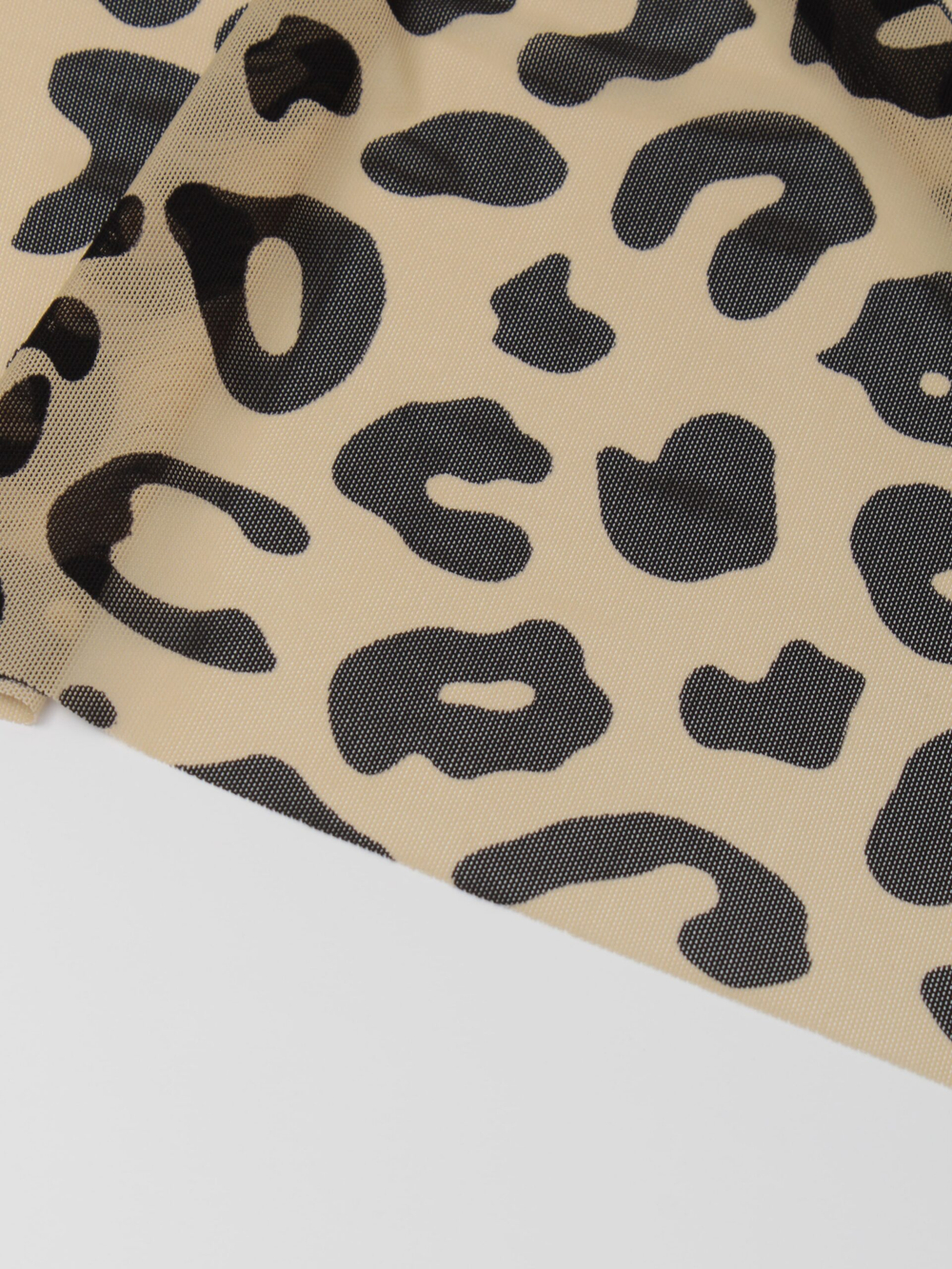 Сетка эластичная бежевая с черным принтом барс метражом