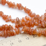 Солнечный камень бусины, крошка 3-7 мм, цена за нить 38 см