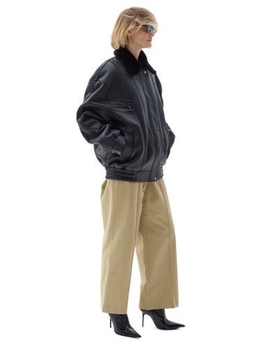 Черная кожаная оверсайз дубленка с отложным воротником