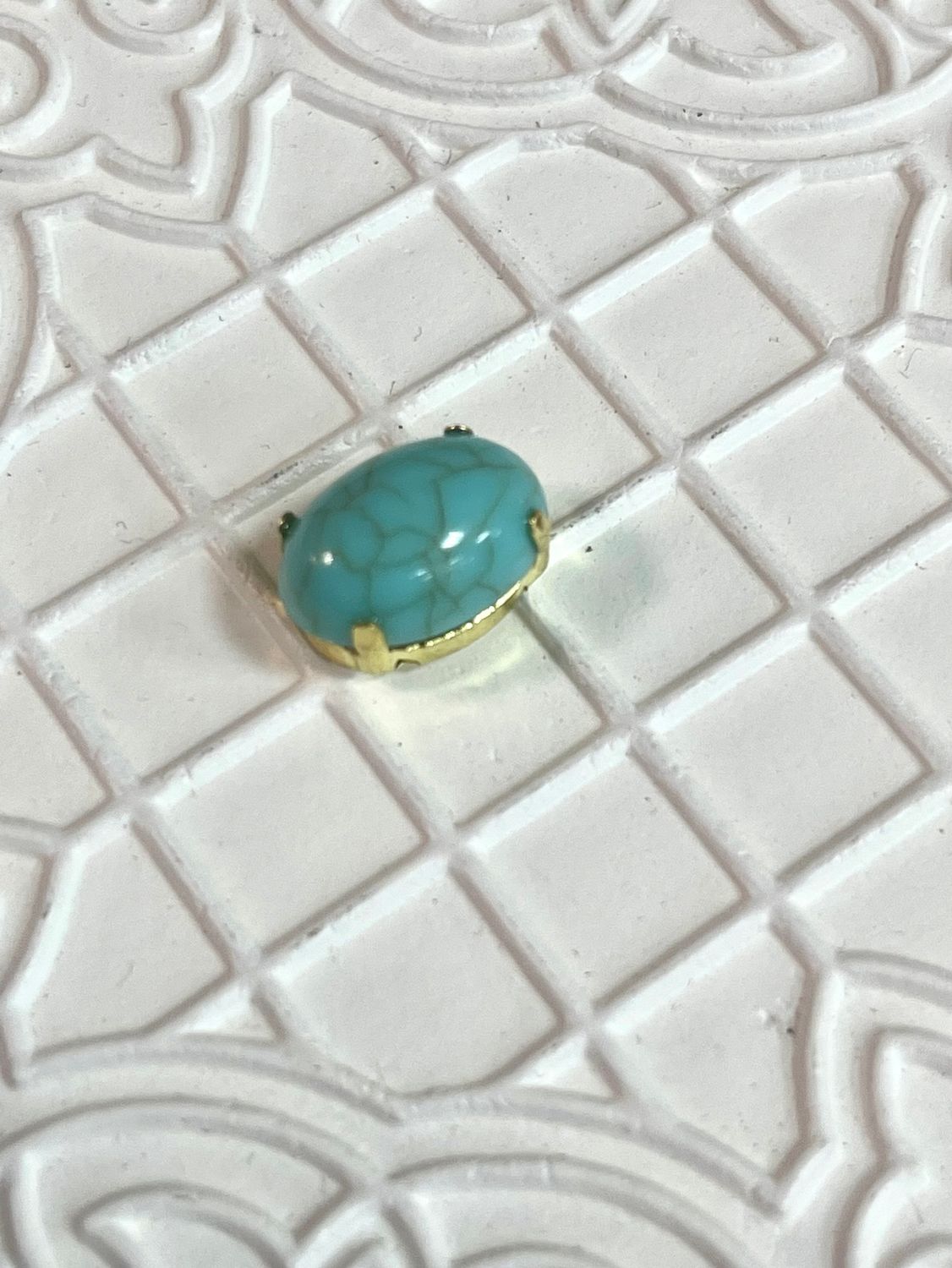 камень в цапках 