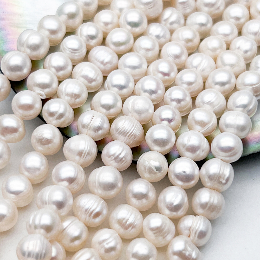 Жемчуг бусины, размер около 6-7 мм, цена за отрезок 17 см (1/2 нити)