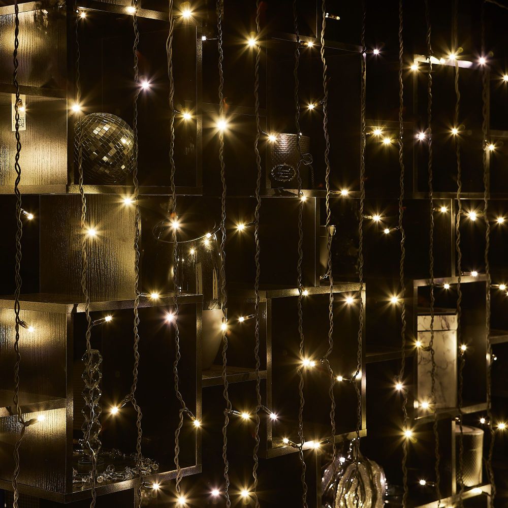 ULD-C3020-384-TBK WARM WHITE IP67 Занавес светодиодный с эффектом мерцания. 3х2м. Соединяемый. 384 светодиода. Теплый белый свет. Провод черный. TM Uniel