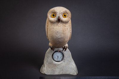 Сова с часами