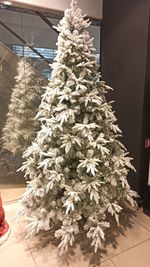 Заснеженная ель с гирляндой «Форесто» теплый свет (Литая+пвх) от 1.2 до 2.4 м