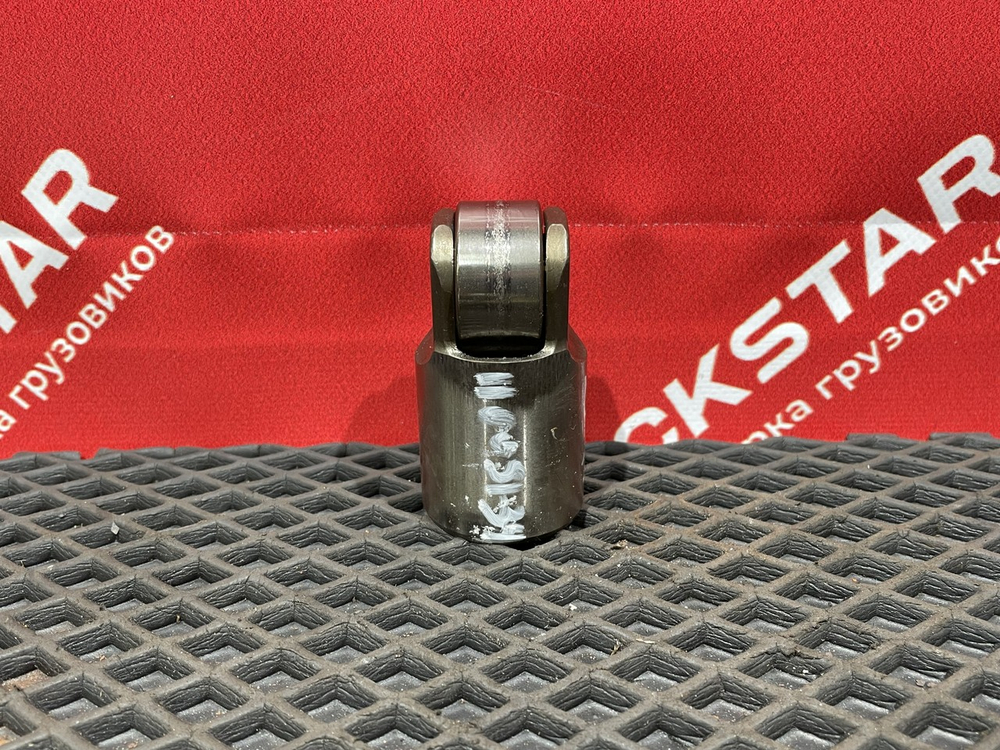 Толкатель выпускного клапана